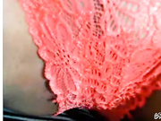 Играется с игрушкой.