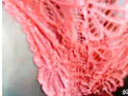 Играется с игрушкой.