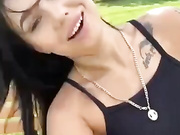 BellaLike на скамейке в парке